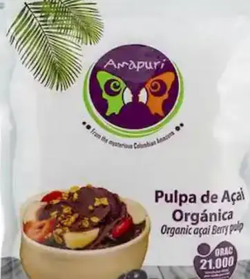 Packaging of Amapuri Organic Açaí Berry Pulp, featuring a colorful butterfly logo and a bowl with açaí, sliced fruit, and granola. ORAC 21,000 is noted on the package.